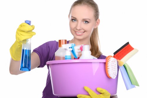 Professional cleaner assessing a rug before treatment