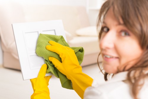 Technician preparing a carpet cleaning process in a Dollis Hill property